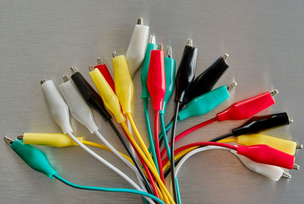 Electricians check the cables with different colors